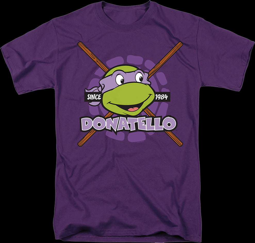 https://www.80stees.com/cdn/shop/products/purple-donatello-since-1984-teenage-mutant-ninja-turtles-t-shirt.master.jpg?v=1700696395